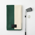 Magnetic Tour Towel flat lay with golf club and ball marker